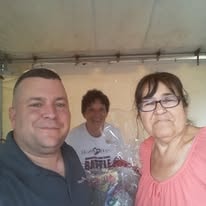 Three Hearts with Hope members at a community event