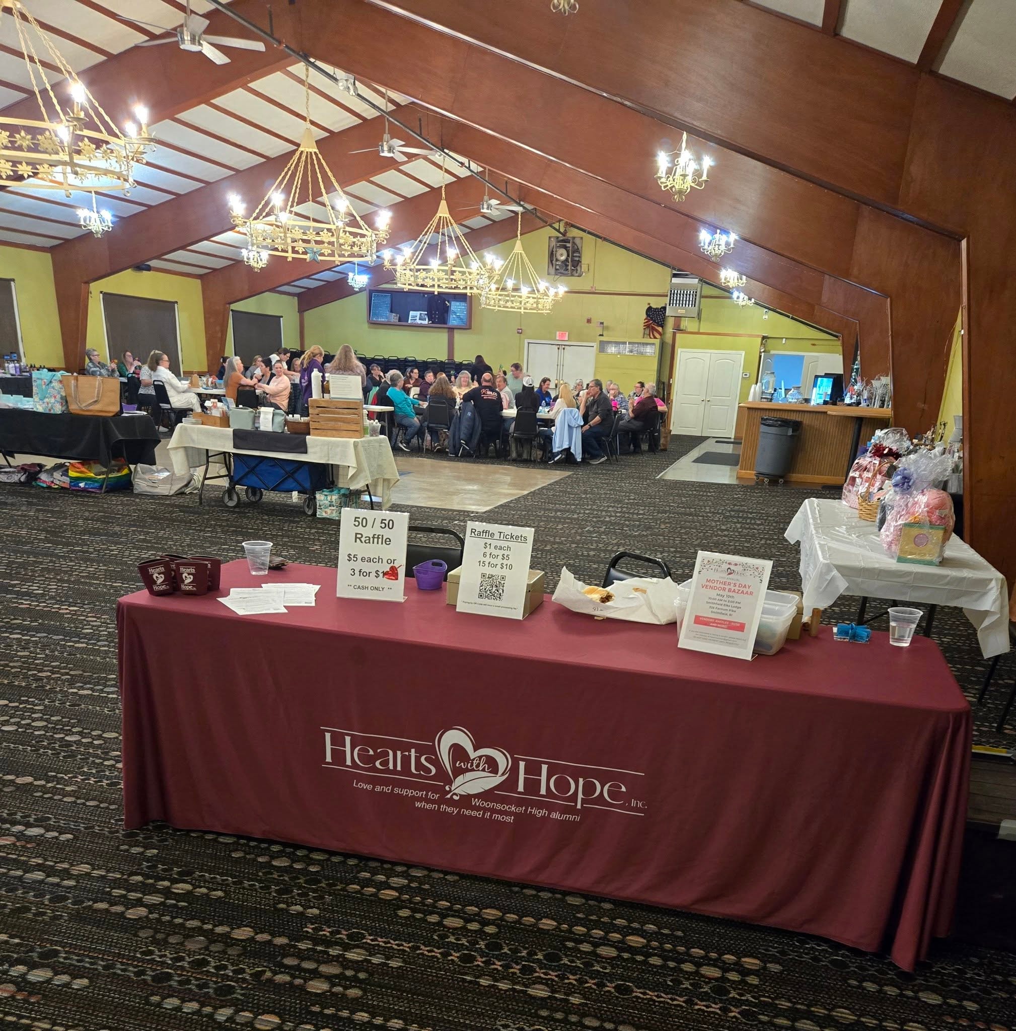 Hearts with Hope members smiling together at a community event