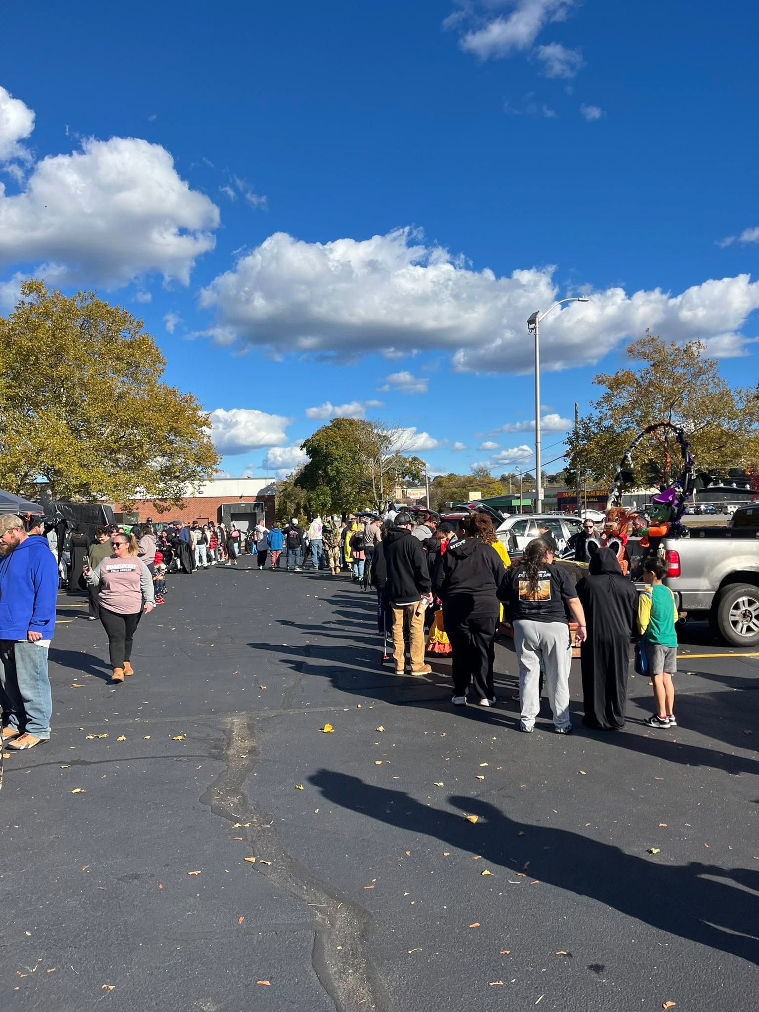 Long line of community members at the Hearts with Hope Trunk or Treat event