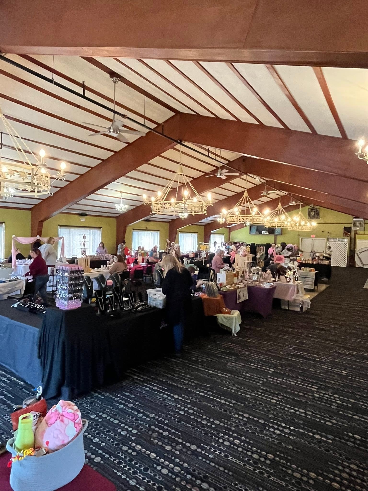 Vendor tables with jewelry and goods at a Hearts with Hope Fall Vendor Bazaar